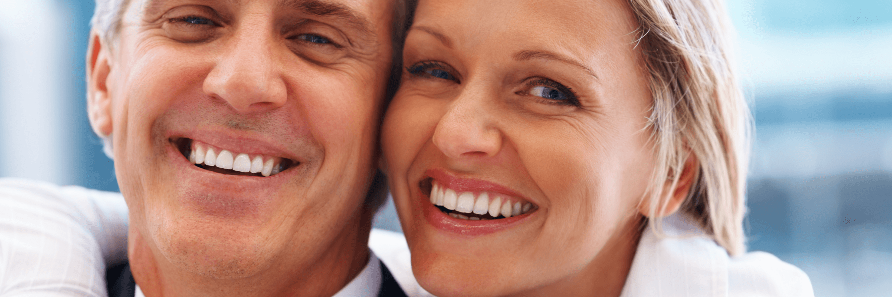 happy couple dental crowns