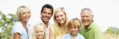 Family of dental patients smiling in St Louis MO